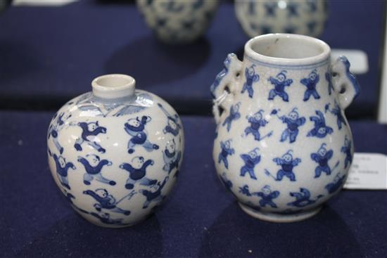 Two Chinese blue and white hundred boys vases, larger 8cm.